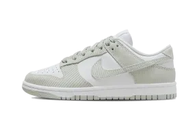 Nike Dunk Low Grey Corduroy can be rewritten as Nike Dunk Low Grey Corduroy sneakers.